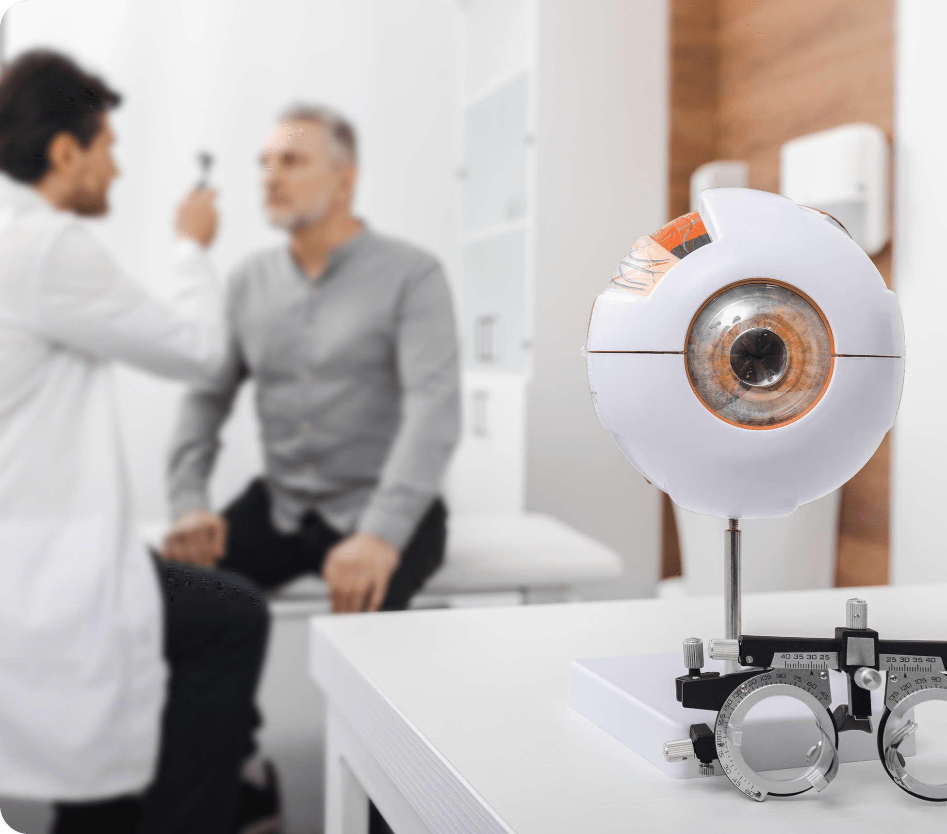 Doctor examining patient's vision in clinic